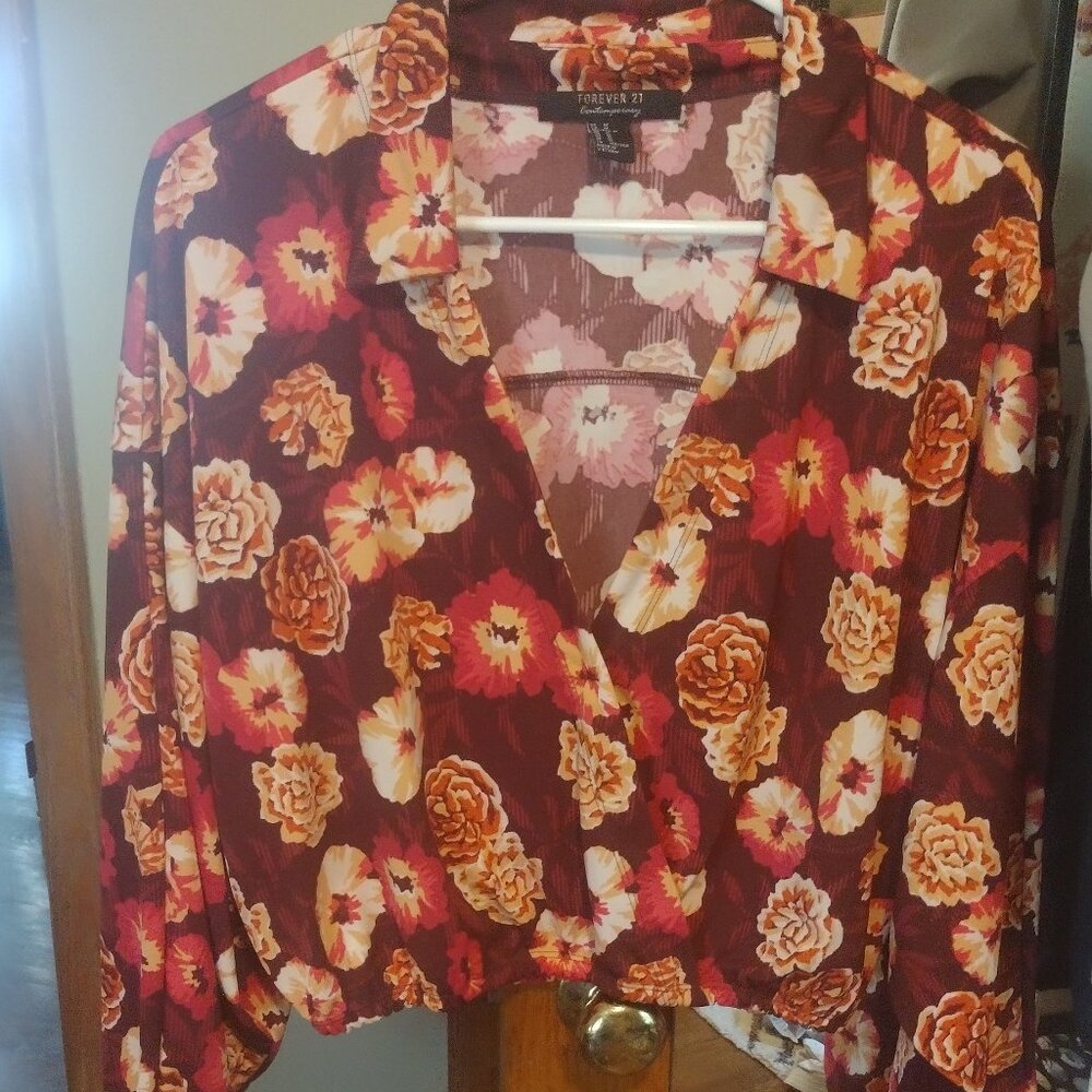 Contemporary beautiful floral plunge blouse